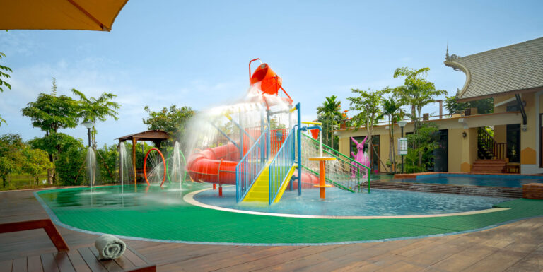 Resort swimming pool in Kampot with water playground and family-friendly facilities – hotel photography Cambodia