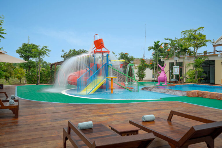 Resort swimming pool in Kampot with water playground and family-friendly facilities – hotel photography Cambodia