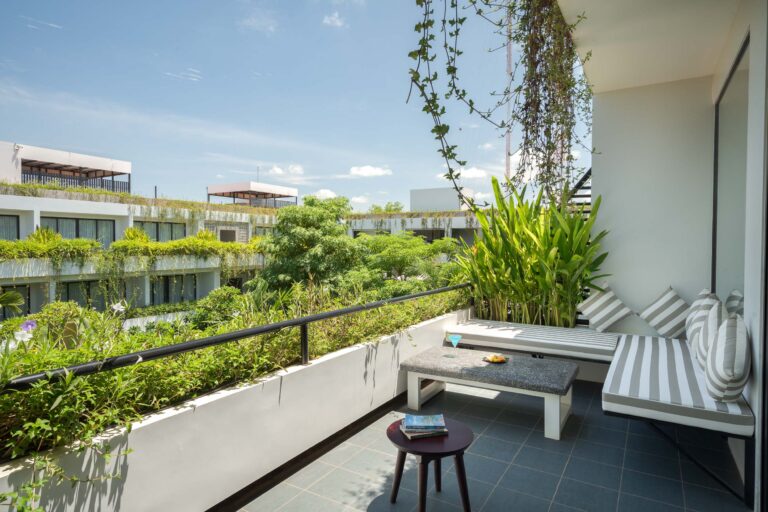 balcony view in a Suite at eightfold urban hotel in siem reap, photographed by professional hotel photographer Expsoure photography