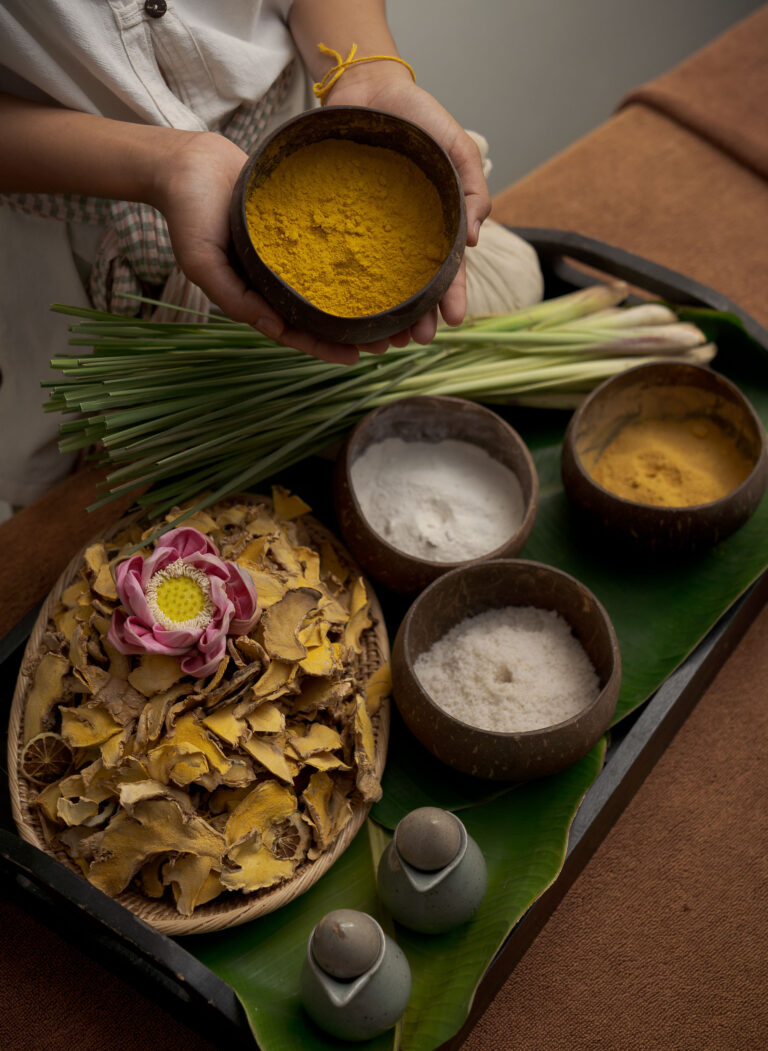 Luxury spa products and natural ingredients prepared for a massage at La Rivière d'Angkor boutique hotel in Siem Reap