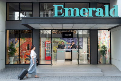 Exterior of Emerald Hotel with a model Photographed by Exposure hotel photography
