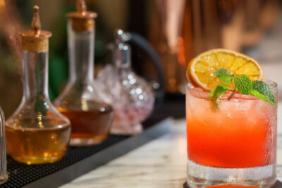 hotel bar photography Cambodia cocktail drinks with citrus garnish