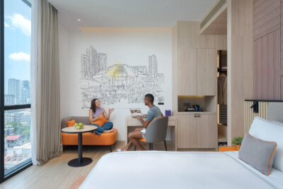 Luxury hotel room photography with models at Capri by Fraser, Phnom Penh, Cambodia